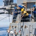 USS Russell (DDG 59) refuels and replenishes at sea with the USNS John Ericsson (T-AO 194)