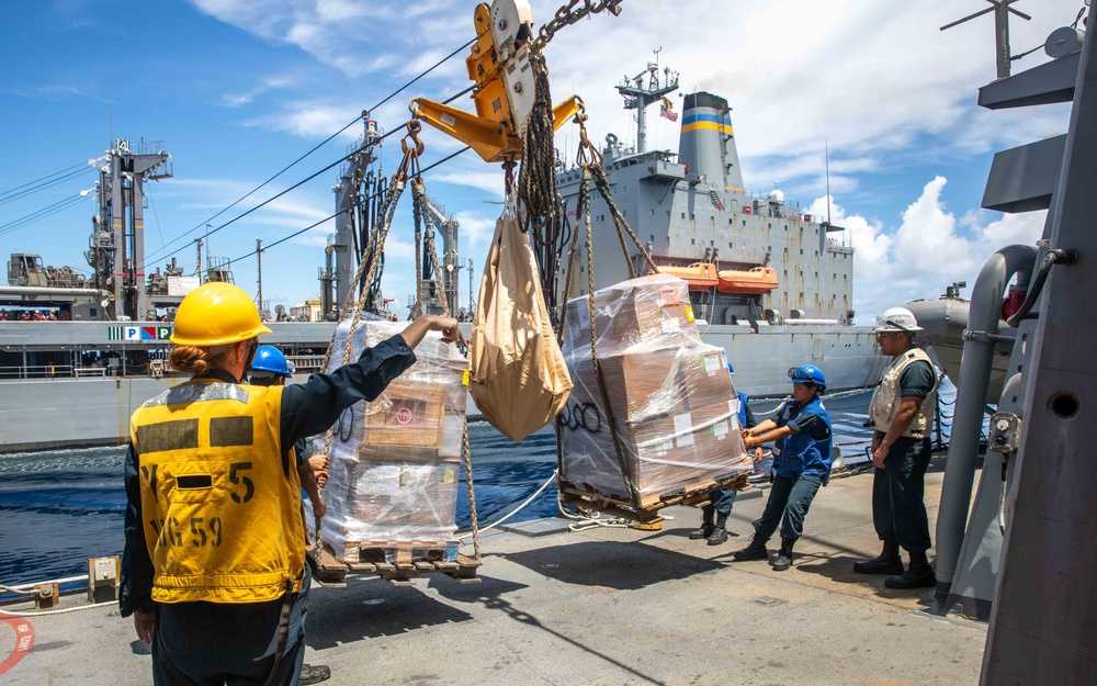 USS Russell (DDG 59) refuels and replenishes at sea with the USNS John Ericsson (T-AO 194)