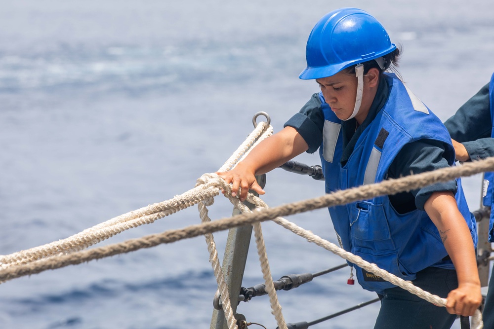 USS Russell (DDG 59) refuels and replenishes at sea with the USNS John Ericsson (T-AO 194)
