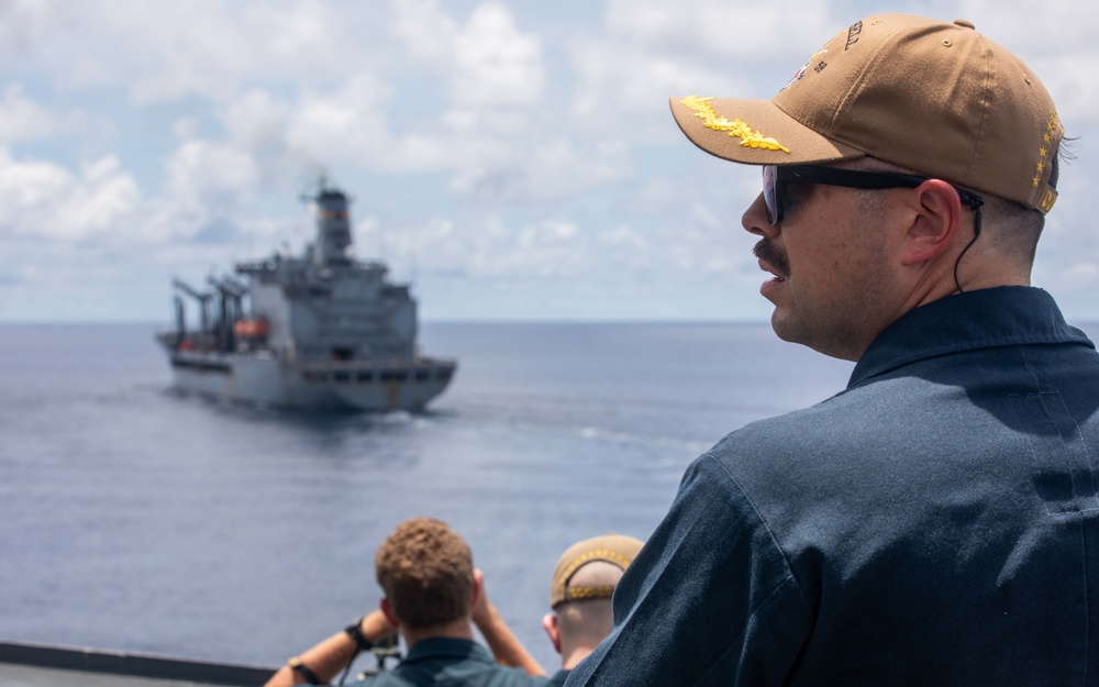 USS Russell (DDG 59) refuels and replenishes at sea with the USNS John Ericsson (T-AO 194)