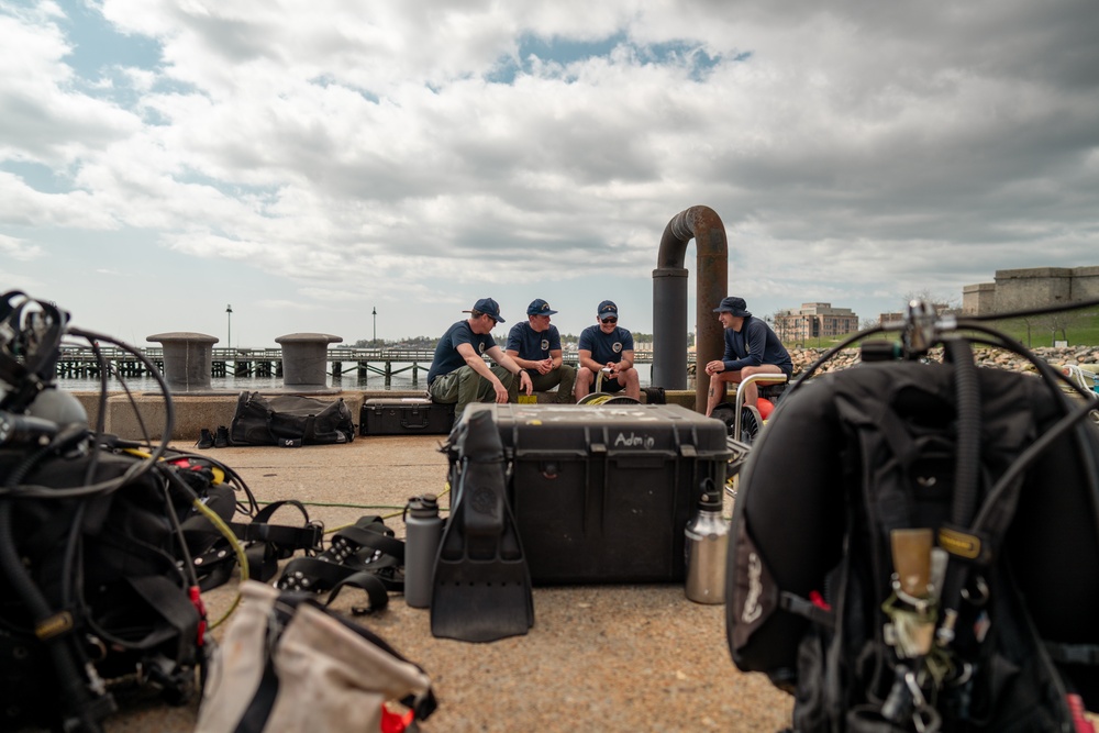 Divers inspect Coast Guard Cutter Eagle