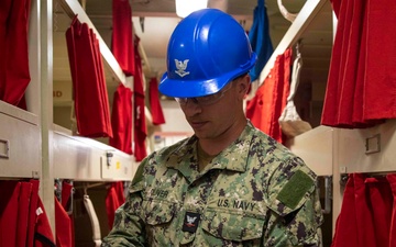 USS Makin Island Sailors Replace EEBD Rack Housings
