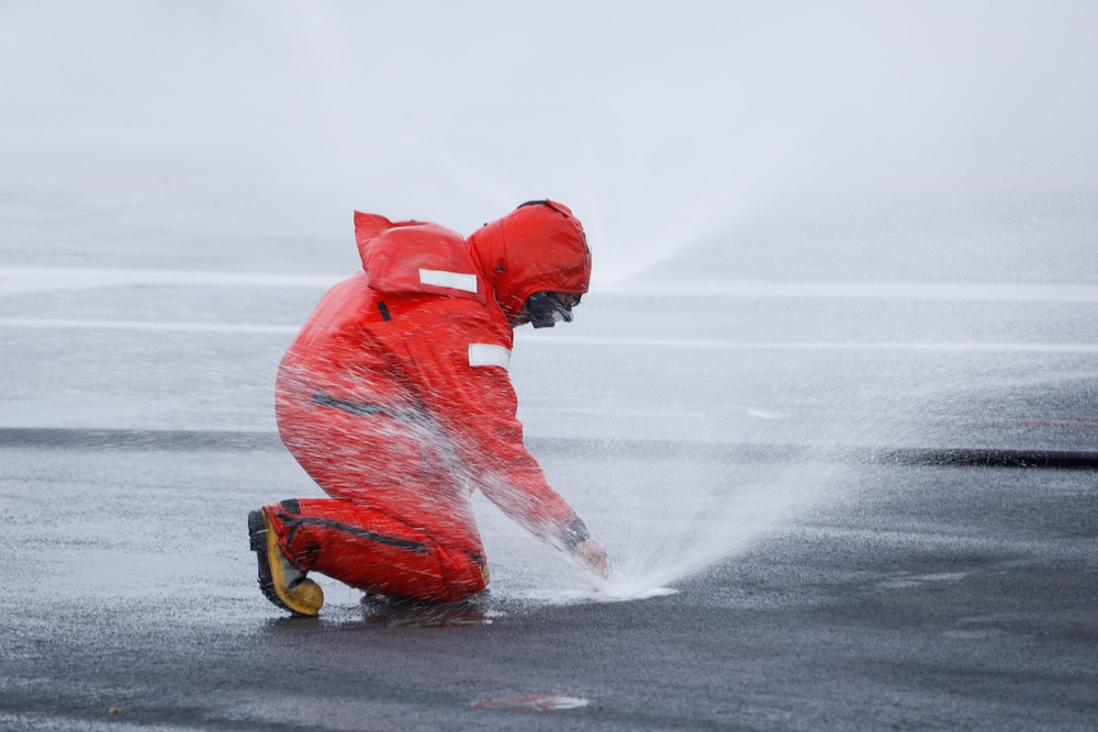 Abraham Lincoln conducts counter measure washdown