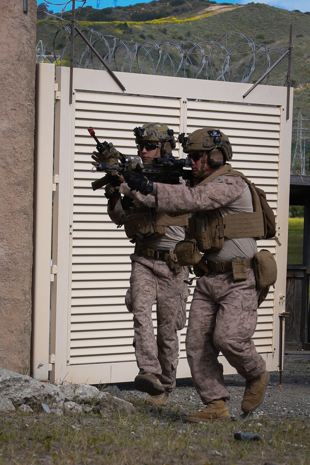 3rd Bn., 4th Marines patrols through infantry immersion trainer