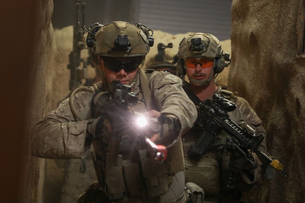 3rd Bn., 4th Marines patrols through infantry immersion trainer