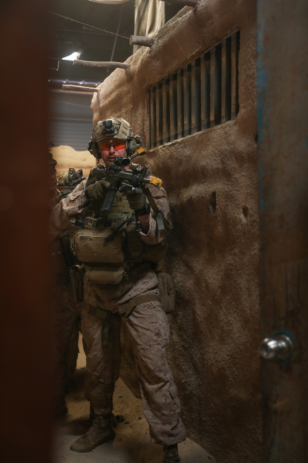 3rd Bn., 4th Marines patrols through infantry immersion trainer