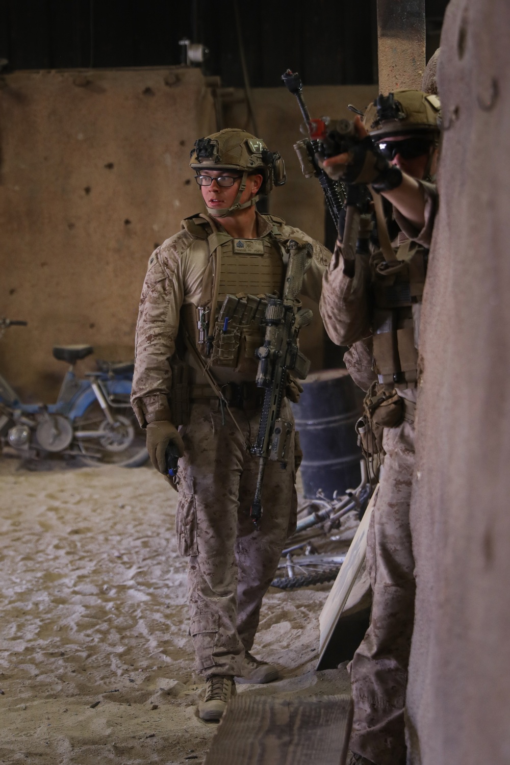 3rd Bn., 4th Marines patrols through infantry immersion trainer