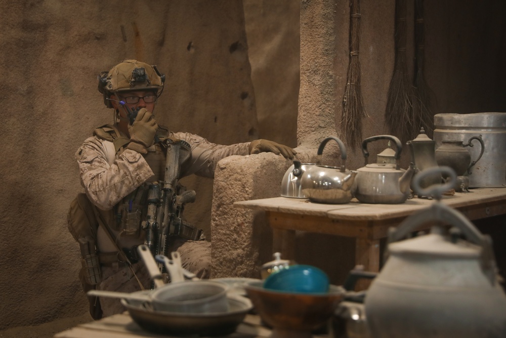 3rd Bn., 4th Marines patrols through infantry immersion trainer