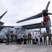 Members of the Ministry of Foreign Affairs of Japan tour MV-22B Osprey aircraft, simulator