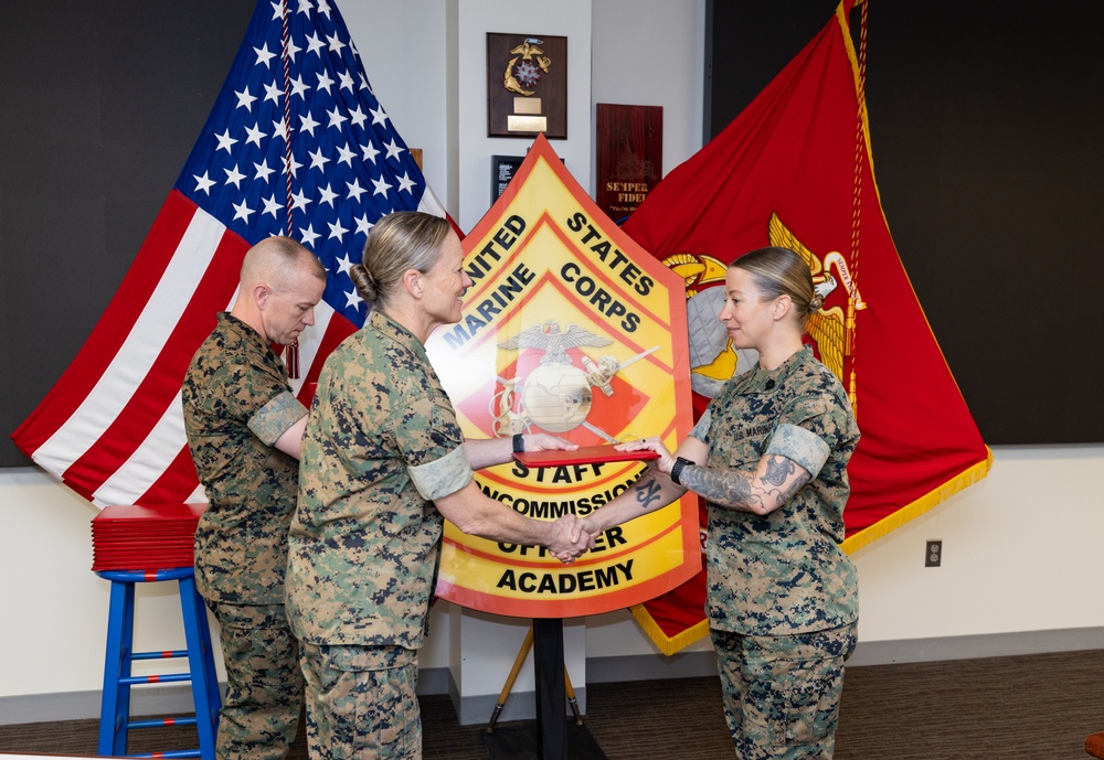 Graduation ceremony for Faculty Advisor, Military Occupation Specialty 0961.