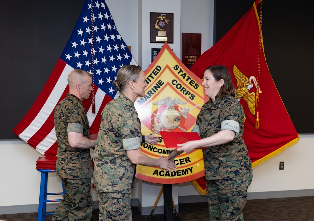 Graduation ceremony for Faculty Advisor, Military Occupation Specialty 0961.