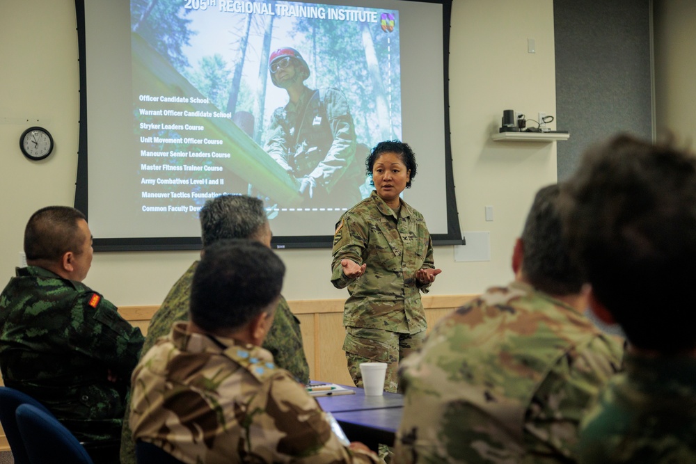 Foreign defense attachés learn about Washington National Guard capabilities from senior joint staff
