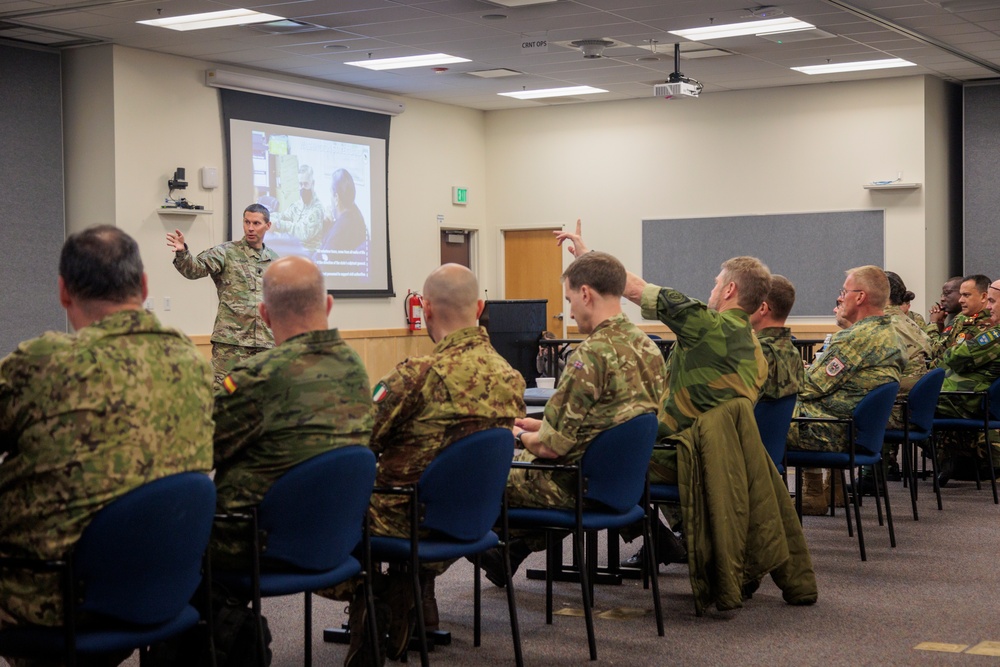 Foreign defense attachés learn about Washington National Guard capabilities from senior joint staff