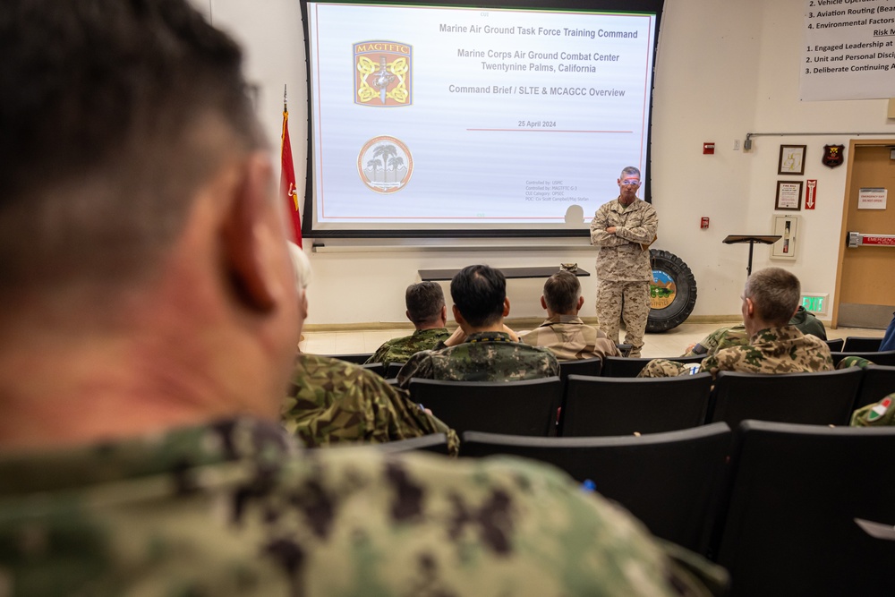 The Combat Center demonstrates capabilities to naval attachés from various nations