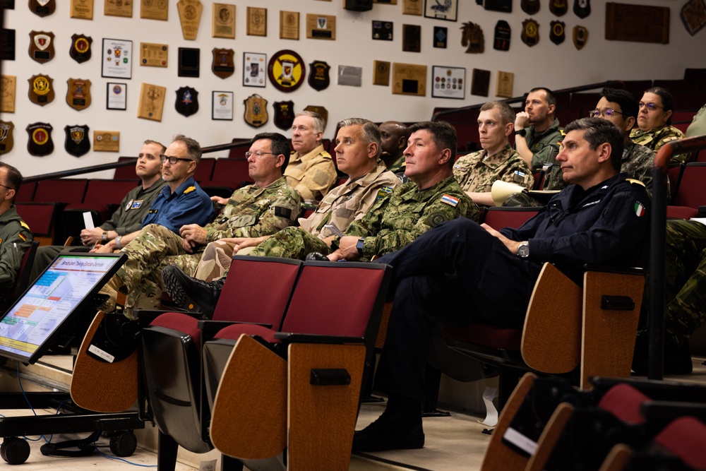 The Combat Center demonstrates capabilities to naval attachés from various nations