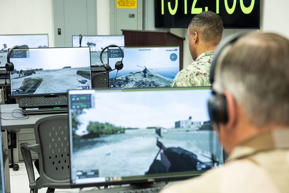 The Combat Center demonstrates capabilities to naval attachés from various nations