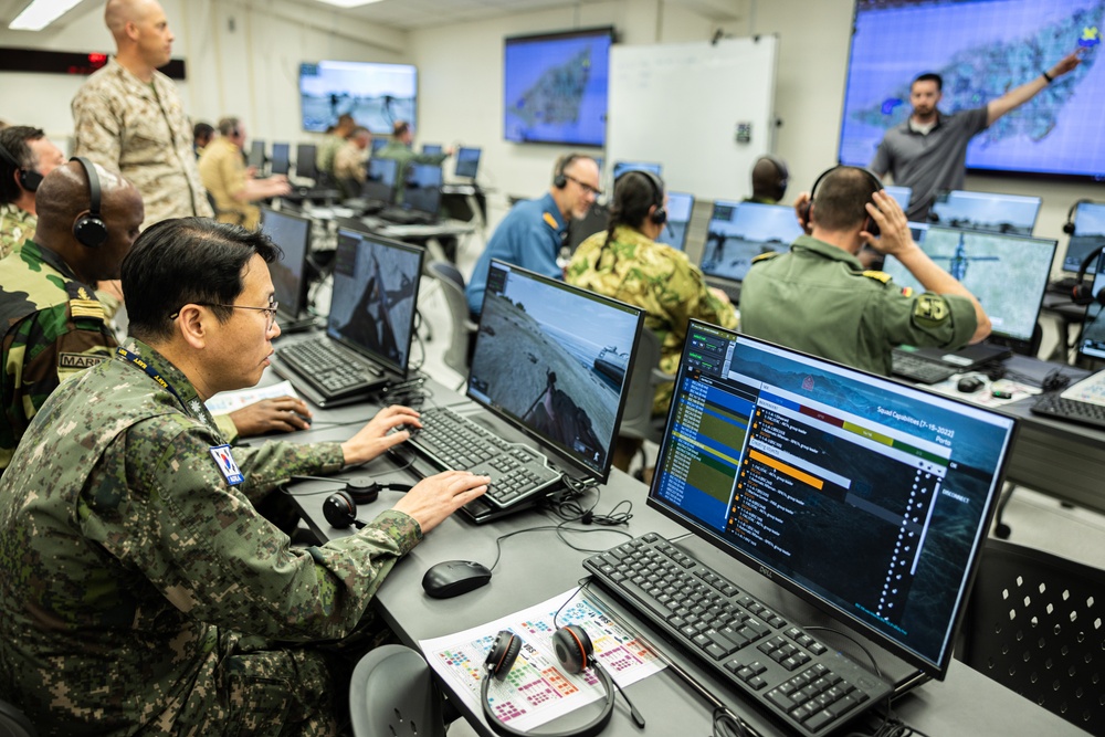 The Combat Center demonstrates capabilities to naval attachés from various nations