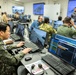 The Combat Center demonstrates capabilities to naval attachés from various nations