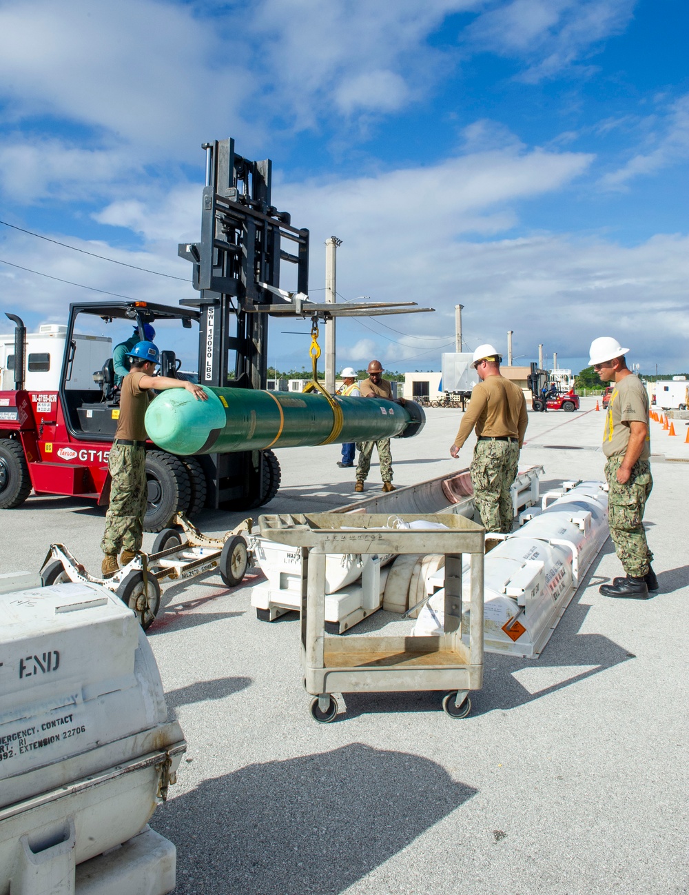 USS Frank Cable Sailors Assist Weapons Load of Mark 48 Torpedoes on USS Annapolis