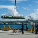 USS Frank Cable Sailors Assist Weapons Load of Mark 48 Torpedoes on USS Annapolis