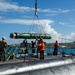 USS Frank Cable Sailors Assist Weapons Load of Mark 48 Torpedoes on USS Annapolis