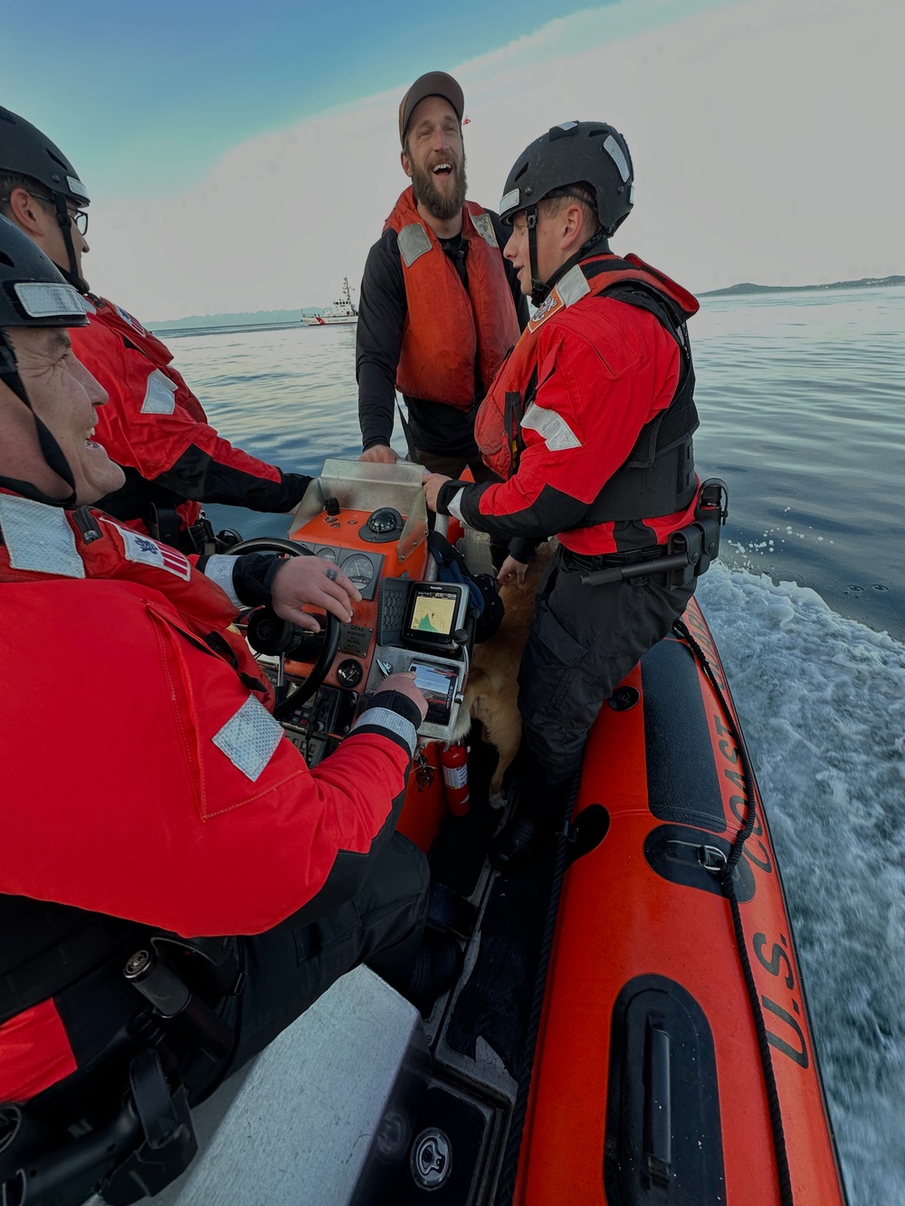 Coast Guard Cutter Adelie crew rescues man and dog after fishing vessel sinks near Henry Island, Washington