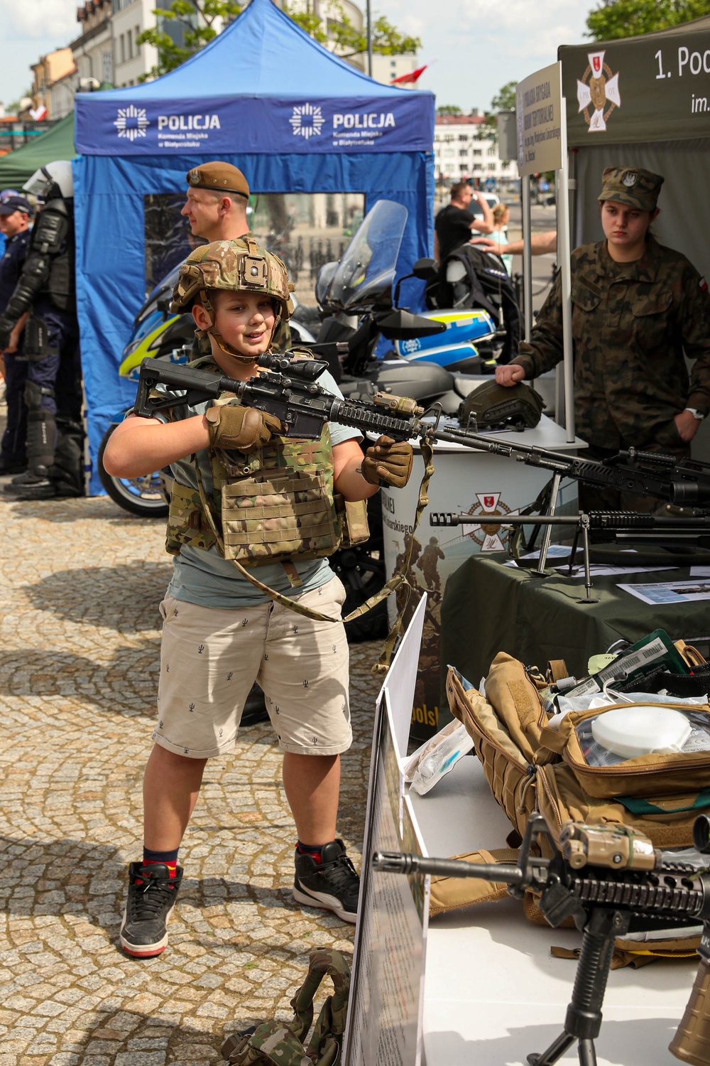 U.S. Army soldiers host a static display at a Polish Constitution Day celebration