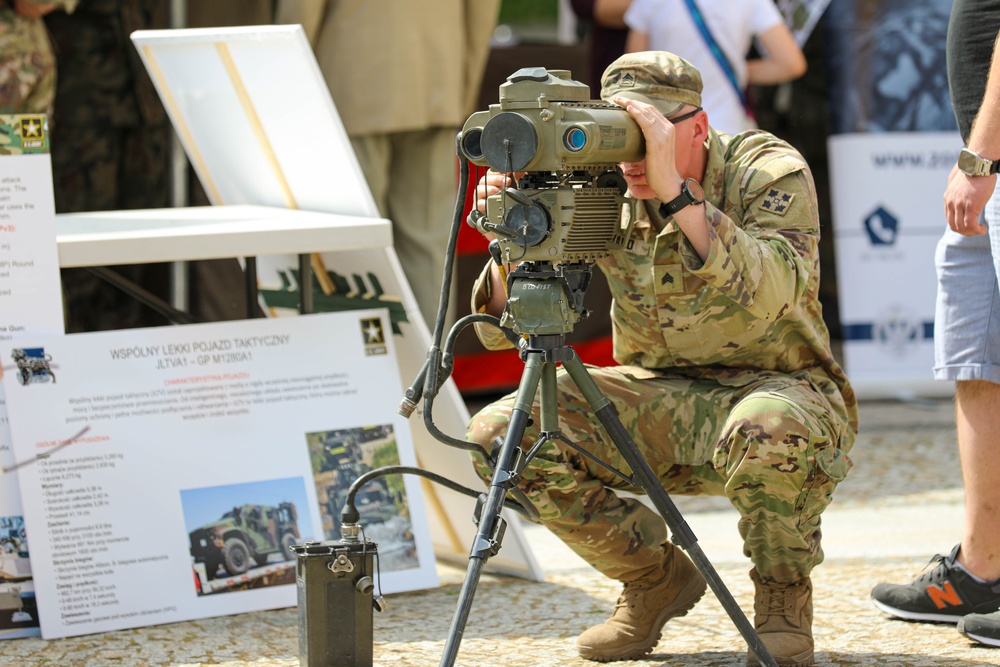 U.S. Army soldiers host a static display at a Polish Constitution Day celebration