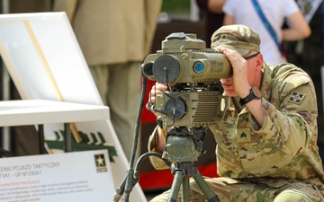 U.S. Army soldiers host a static display at a Polish Constitution Day celebration