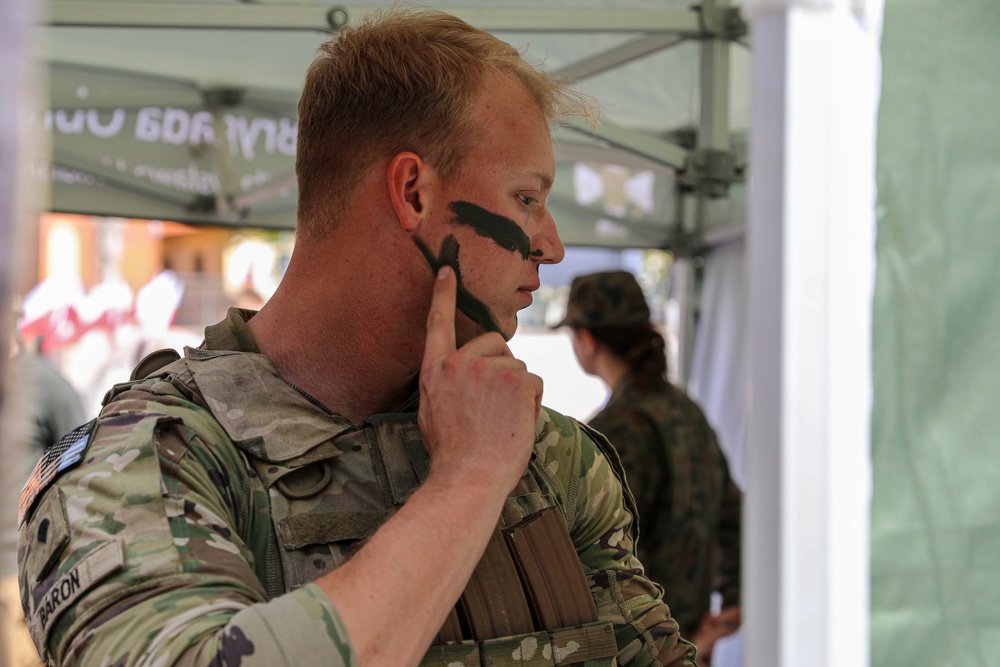 U.S. Army soldiers host a static display at a Polish Constitution Day celebration