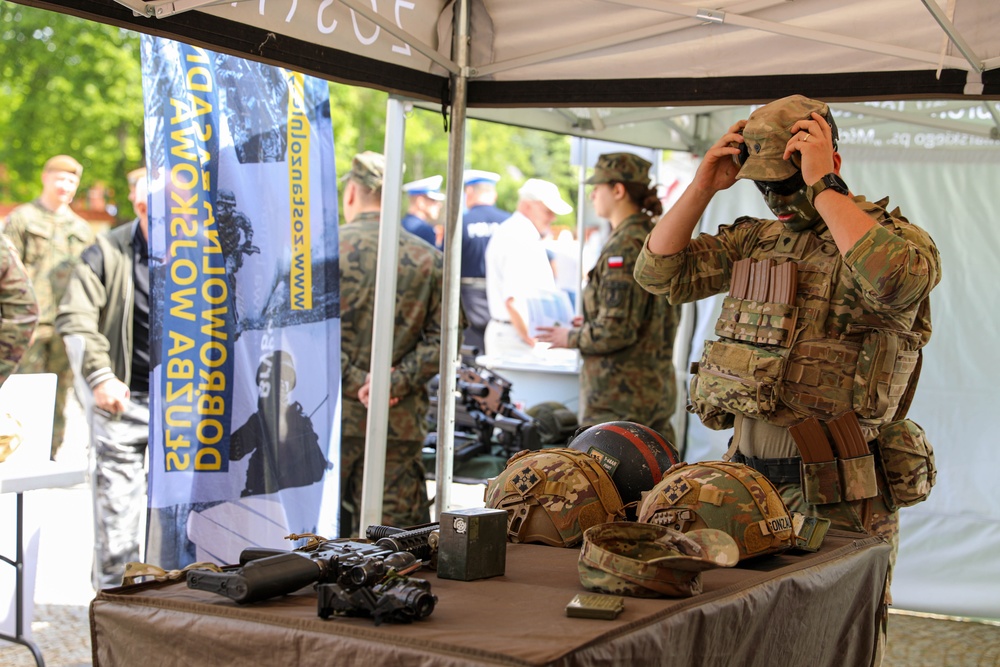 U.S. Army soldiers host a static display at a Polish Constitution Day celebration