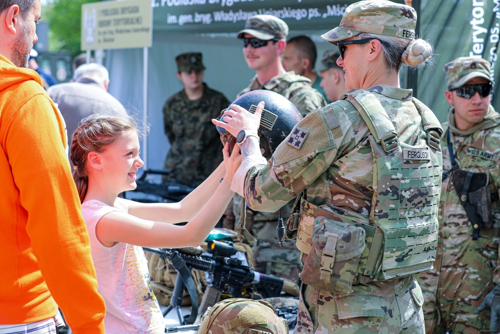 U.S. Army soldiers host a static display at a Polish Constitution Day celebration