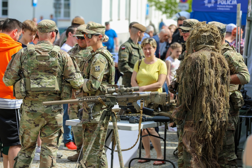 U.S. Army soldiers host a static display at a Polish Constitution Day celebration