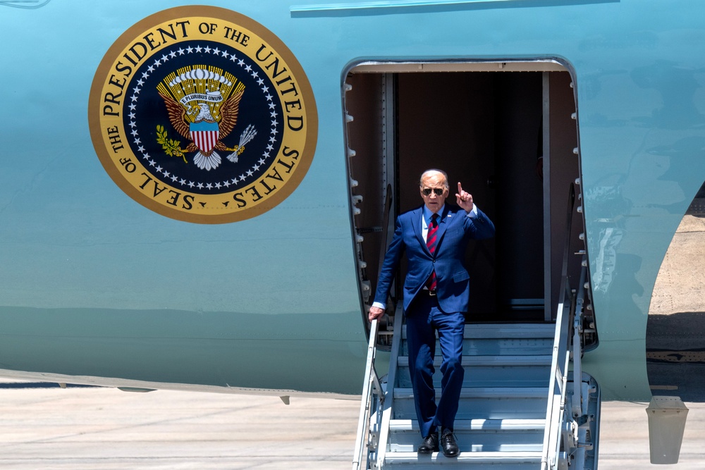 President Joe Biden pays respect to fallen law enforcement officers at the 145th Airlift Wing