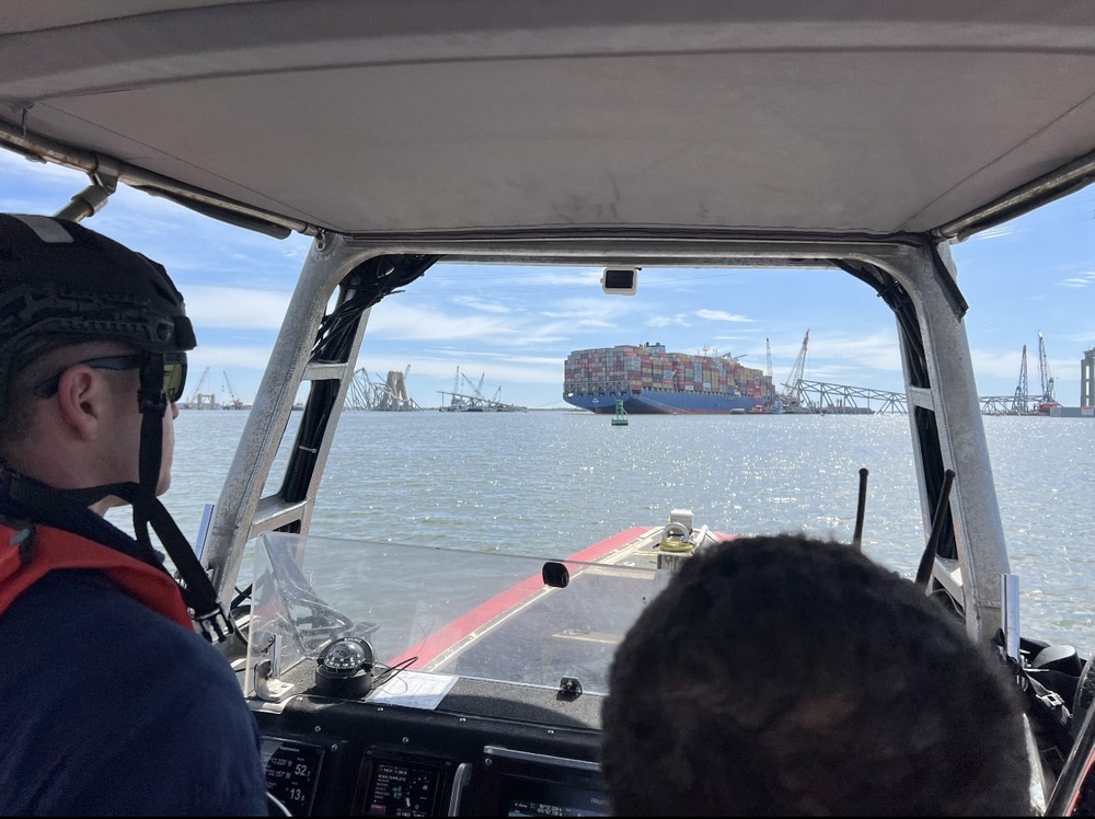 US Coast Guard Cutter Diligence's small boat crew responds to Francis Scott Key Bridge collapse