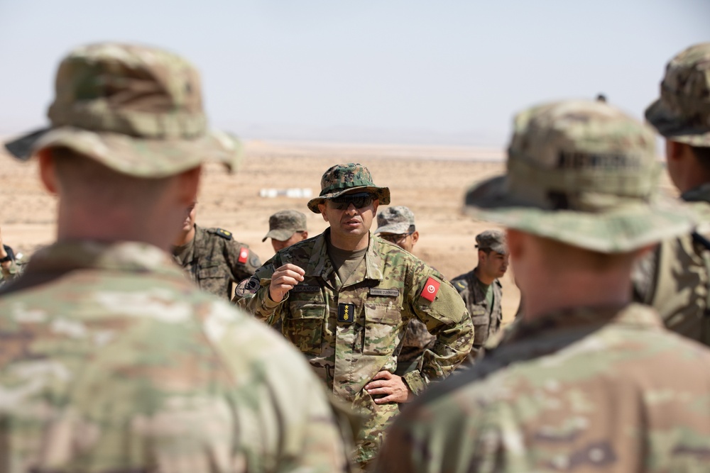 US joint service members coordinate with Tunisian forces during live-fire drills in Ben Ghilouf