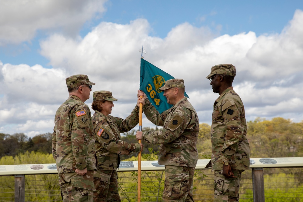 The Soldiers of the 364th Theater Public Affairs Support Element welcome their new commander.