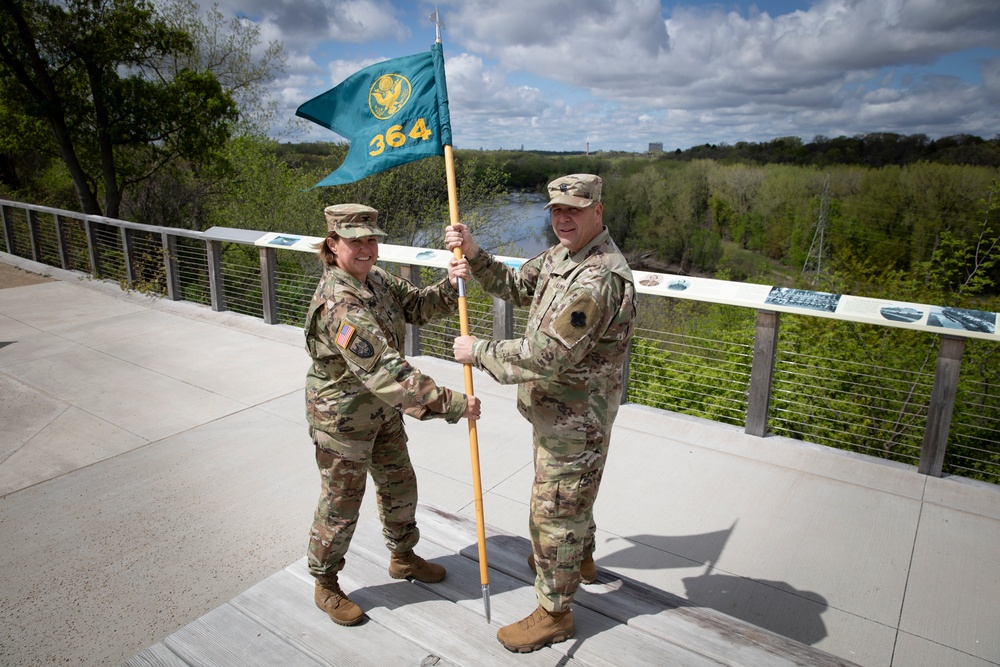 The Soldiers of the 364th Theater Public Affairs Support Element welcome their new commander.