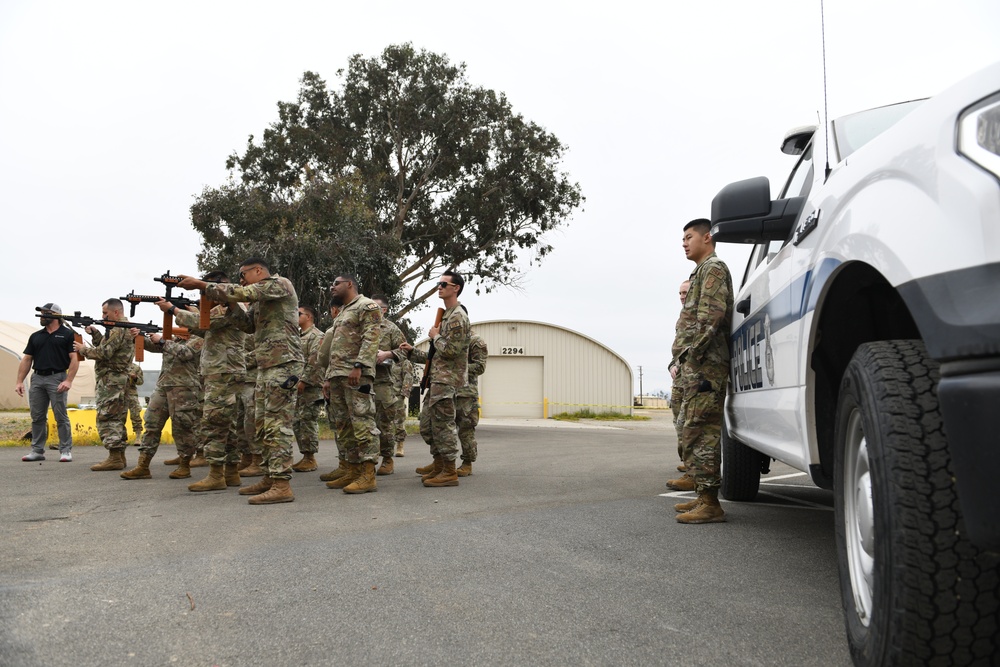 Airmen of the 163d Security Forces Squadron certify on PepperBall projectile launchers
