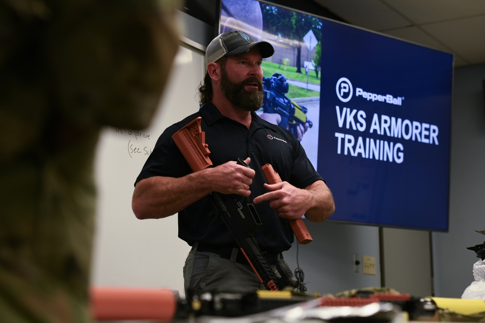 Airmen of the 163d Security Forces Squadron certify on PepperBall projectile launchers