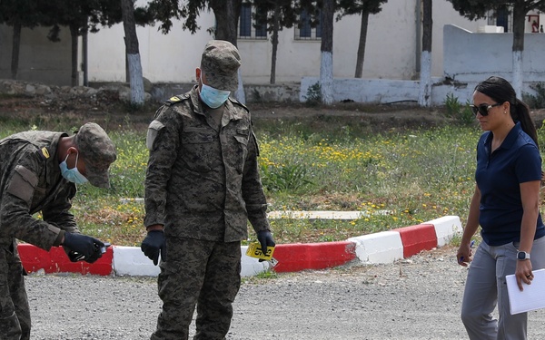 Members of the Joint Theater Forensic Analysis Center train Tunisian Armed Forces at a simulated bomb site at African Lion 2024