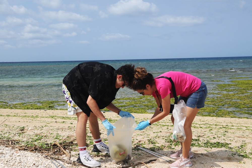 Volunteers on Okinawa work together to beautify beach on Earth Day