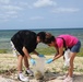 Volunteers on Okinawa work together to beautify beach on Earth Day