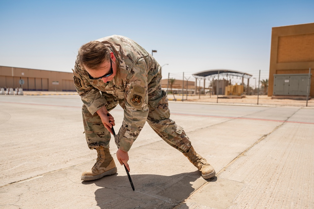 U.S. Air Force and Marine Corps conduct flightline repairs demonstrating joint integration