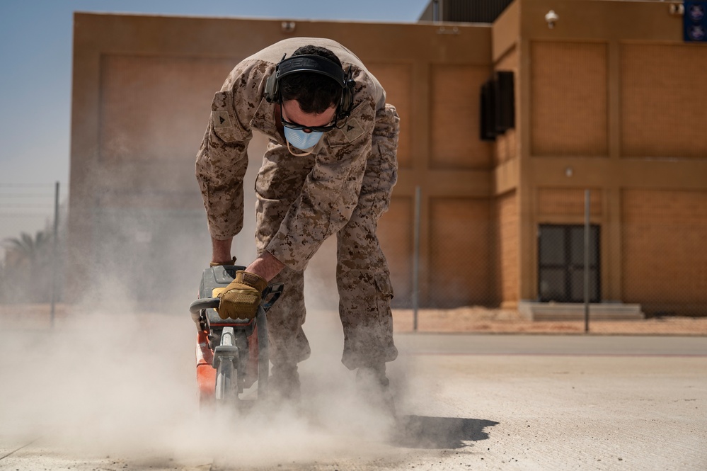 U.S. Air Force and Marine Corps conduct flightline repairs demonstrating joint integration