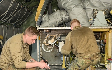 Airmen perform routine maintenance on a KC-135 at Selfridge Air National Guard Base