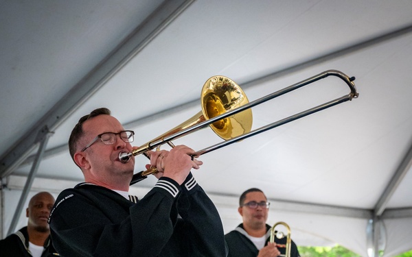 U.S. Fleet Forces Brass Band "Uncharted Waters" performs at the 2024 Virginia International Tattoo Hullaballoo
