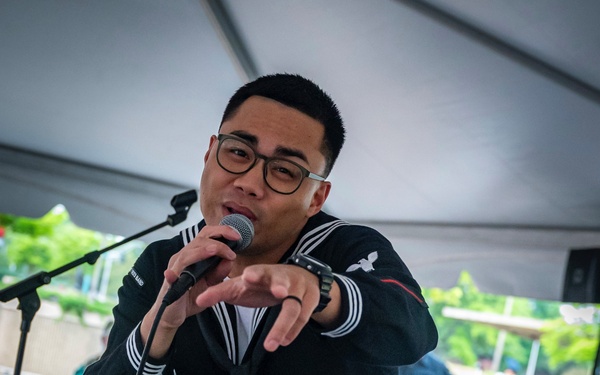 U.S. Fleet Forces Brass Band "Uncharted Waters" performs at the 2024 Virginia International Tattoo Hullaballoo