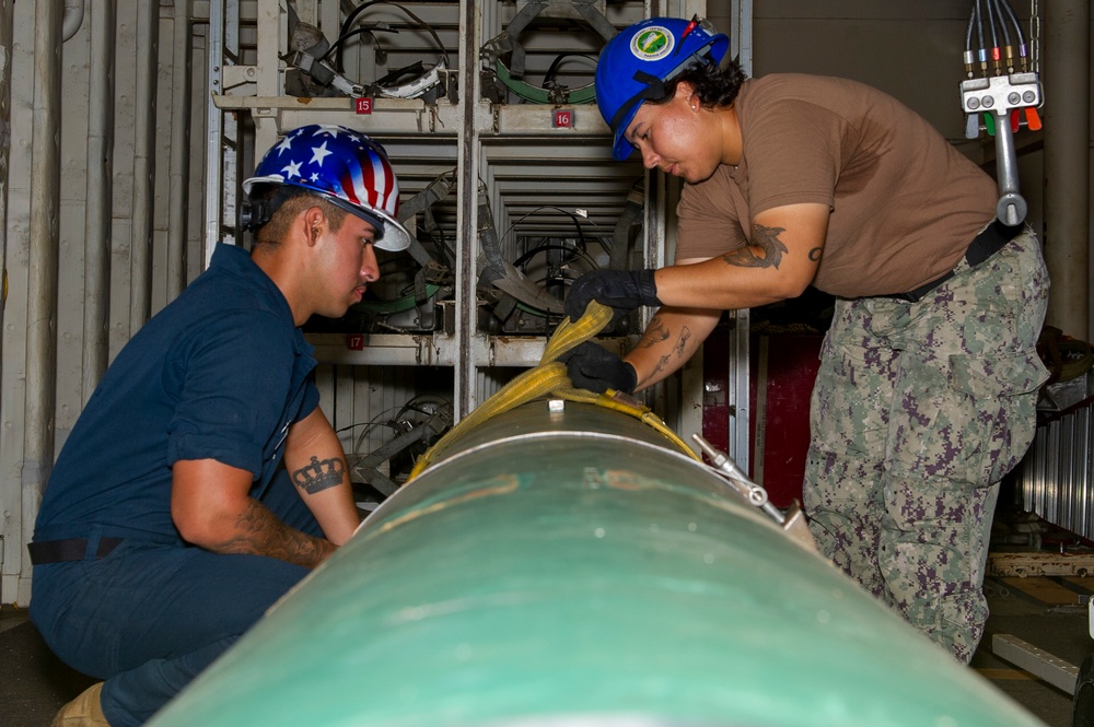 USS Frank Cable Conducts Weapons Handling Training with USS Springfield