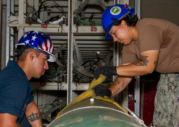 USS Frank Cable Conducts Weapons Handling Training with USS Springfield